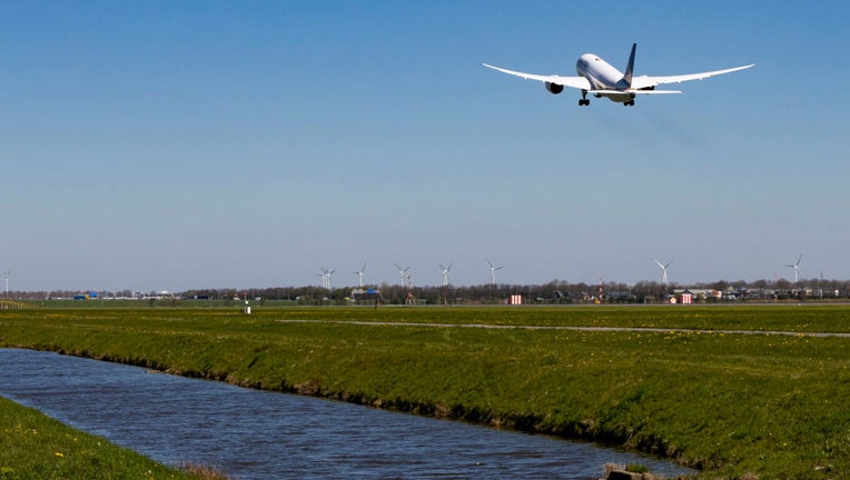 FILE IMAGE - A Boeing 787-8 Dreamliner aircraft as seen during take off passing in front of the control tower and flying as it is departing from Amsterdam Schiphol Airport AMS EHAM on a blue sky day. (Photo by Nicolas Economou/NurPhoto via Getty Images)