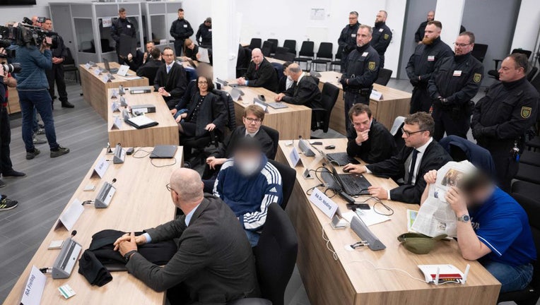 Defendants sit on May 16, 2023, at the Higher Regional Court in Dresden, eastern Germany, prior to a hearing in the trial over a jewelry heist on the Green Vault (Gruenes Gewoelbe) museum in Dresdens Royal Palace in November 2019. (Photo by SEBASTIAN KAHNERT/POOL/AFP via Getty Images)