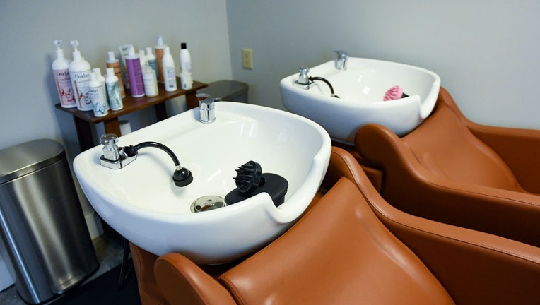 FILE - The hair-washing sinks at a salon in West Reading, Pennsylvania, on June 22, 2021. (Photo by Ben Hasty/MediaNews Group/Reading Eagle via Getty Images)