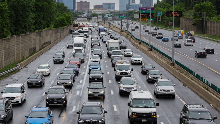 FILE - Vehicles drive on the Capital Beltway, Interstate 495 ahead of the Memorial Day weekend, May 27, 2022, in McLean, Virginia. (Photo by Kevin Dietsch/Getty Images)
