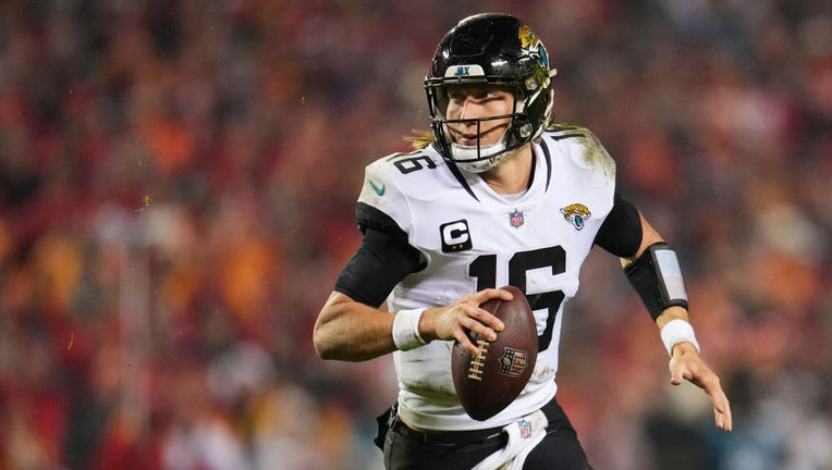 Trevor Lawrence #16 of the Jacksonville Jaguars scrambles against the Kansas City Chiefs at GEHA Field at Arrowhead Stadium on Jan. 21, 2023, in Kansas City, Missouri. (Photo by Cooper Neill/Getty Images)