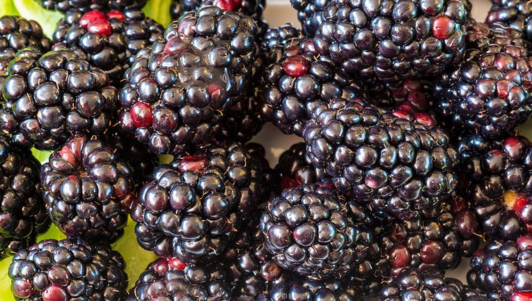 FILE - Blackberries garnished with green Boston lettuce leaves. (Photo by Roberto Machado Noa/LightRocket via Getty Images)