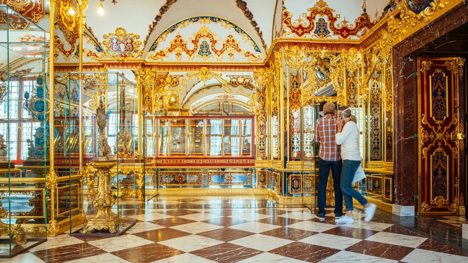 FILE - Visitors look around the jewel room of the Historic Green Vault in the Residence Palace on May 30, 2020, in Saxony, Dresden: (Photo by Oliver Killig/picture alliance via Getty Images)