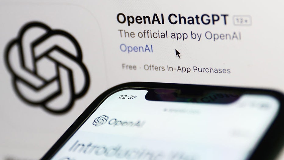 FILE - OpenAI ChatGPT app on App Store website displayed on a screen and OpenAI website displayed on a phone screen are seen in this illustration photo taken on May 18, 2023 (Photo by Jakub Porzycki/NurPhoto via Getty Images)