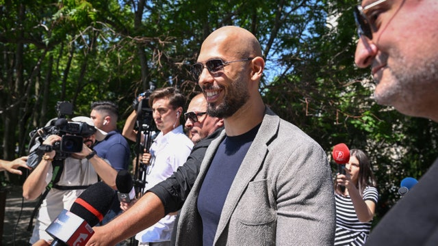 Andrew Tate appears in Romanian court to face rape and human trafficking charges