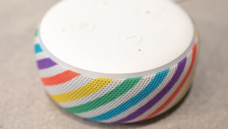 FILE - Close-up of Amazon Echo Dot Kids Edition smart speaker, designed for use by children, with rainbow color scheme, using the Alexa voice assistant, on Aug. 31, 2019. (Photo by Smith Collection/Gado/Getty Images)