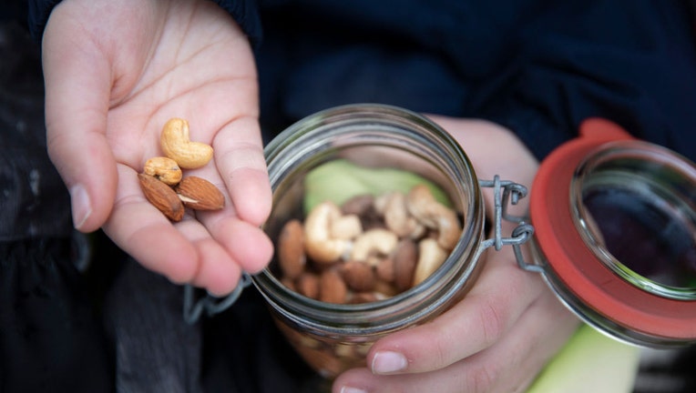 FILE - Nuts and almonds are pictured in a file image dated Jan. 9, 2021. (Photo by Ute Grabowsky/Photothek via Getty Images)