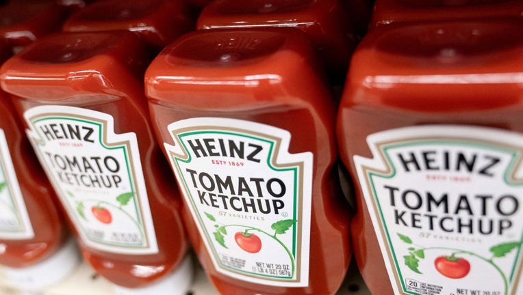 FILE - Heinz ketchup is displayed on a shelf at a grocery store in Washington, DC, on Feb. 15, 2023. (Photo by STEFANI REYNOLDS/AFP via Getty Images)