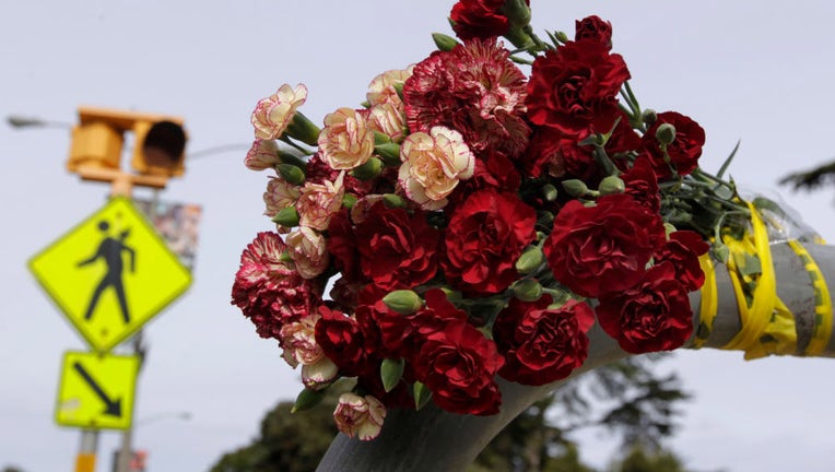 FILE IMAGE - A bouquet of flowers are left at the crosswalk at Sunset Boulevard and Yorba Street in San Francisco, Calif. on Feb. 5, 2014, one day after a pedestrian was hit and killed by a car traveling southbound. (Photo By Paul Chinn/The San Francisco Chronicle via Getty Images)