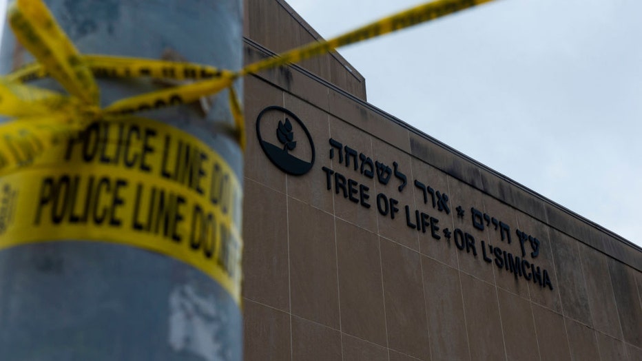 FILE - Police tape wrapped around a traffic light pole out front of the Tree of Life Synagogue in Squirrel Hill outside of Pittsburgh on Oct. 29, 2018. (Photo by Matthew Hatcher/SOPA Images/LightRocket via Getty Images)
