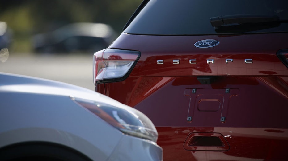 FILE - A Ford Motor Escape sports utility vehicle (SUV) parked in an overflow lot in Louisville, Kentucky, on April 19, 2022. Photographer: Luke Sharrett/Bloomberg via Getty Images