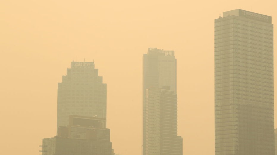 Smoke from wildfires in Canada spread badly at Times Square, known as the World Capital of New York, United States on June 7, 2023. (Photo by Eren Abdullahogullari/Anadolu Agency via Getty Images)