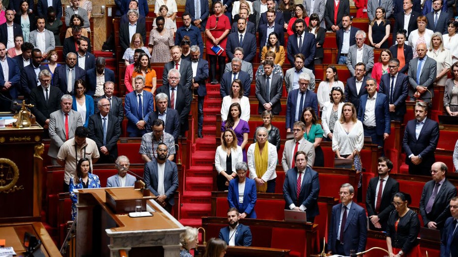 French MPs stand a minute of silence after a knife attack in Annecy, during a session in Paris, on June 8, 2023. (Photo by LUDOVIC MARIN/AFP via Getty Images)