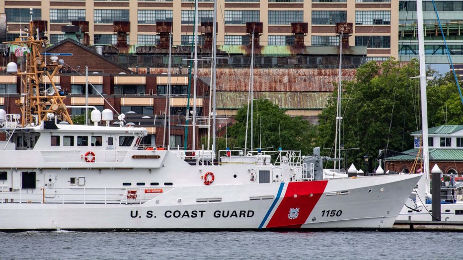 FILE - A U.S. Coast Guard vessel sits in port in Boston Harbor across from the US Coast Guard Station Boston in Boston, Massachusetts, on June 19, 2023. (Photo by JOSEPH PREZIOSO/AFP via Getty Images)