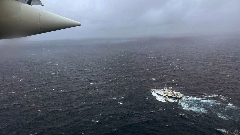 In this U.S. Coast Guard handout, a Coast Guard Air Station Elizabeth City, North Carolina HC-130 Hercules airplane flies over the French research vessel, L'Atalante, approximately 900 miles East of Cape Cod during the search for the 21-foot submersible, Titan, June 21, 2023, over the Atlantic Ocean. (Photo by U.S. Coast Guard via Getty Images)