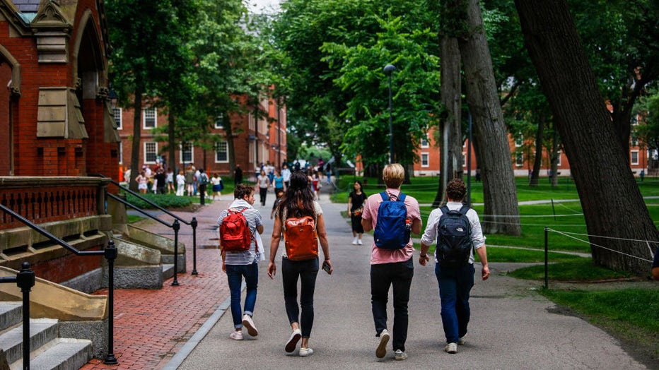 People walks through Harvards campus on June 29, 2023. The US Supreme Court banned the use of affirmative action in college admissions. (Photo by Erin Clark/The Boston Globe via Getty Images)