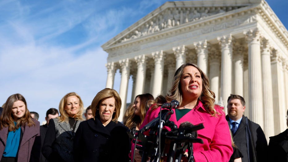 FILE - Lorie Smith, the owner of 303 Creative, a website design company in Colorado, speaks to reporters outside of the U.S. Supreme Court Building on Dec. 5, 2022, in Washington, DC. (Photo by Anna Moneymaker/Getty Images)