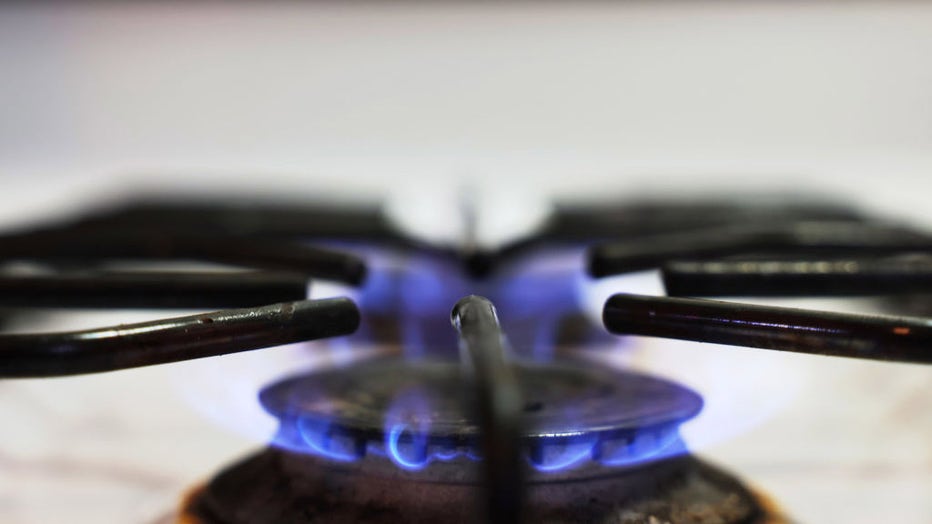 FILE - In this photo illustration, a flame burns on a gas stove on April 28, 2023 in New York City. (Photo Illustration by Michael M. Santiago/Getty Images)
