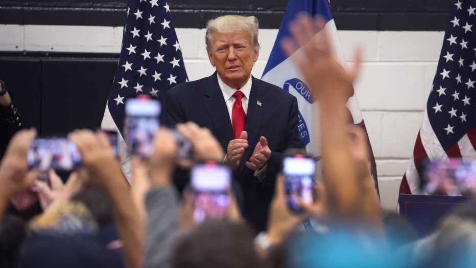 Former President Donald Trump greets supporters at a Team Trump volunteer leadership training event held at the Grimes Community Complex on June 1, 2023, in Grimes, Iowa. (Photo by Scott Olson/Getty Images)