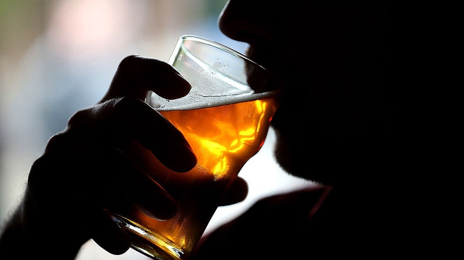 FILE - A person takes a sip of a beer on Feb. 7, 2014, in Santa Rosa, California. (Photo by Justin Sullivan/Getty Images)