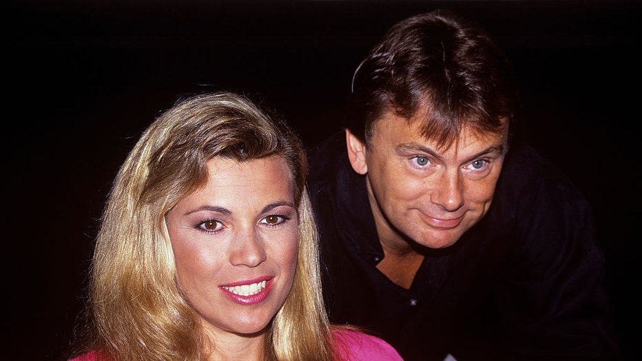 Vanna White and Pat Sajak photographed by Walter McBride in 1990. (Photo by Walter McBride/Corbis via Getty Images)