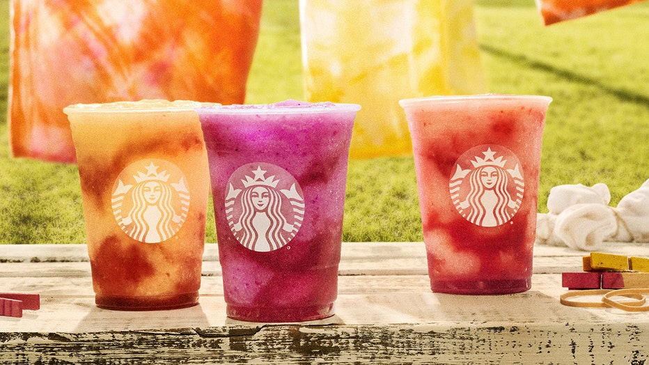 The three new Frozen Lemonade Starbucks Refreshers beverages are pictured: Frozen Strawberry Açai Lemonade, Frozen Pineapple Passionfruit Lemonade, and Frozen Mango Dragonfruit Lemonade. (Photo credit: Starbucks)