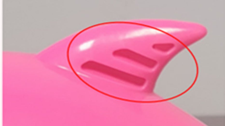 The recalled full-size toys have three grooves on one side of the hard plastic top fin. (Credit: CPSC)