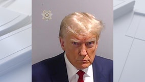 Trump mug shot released after former president turns himself in at Georgia jail