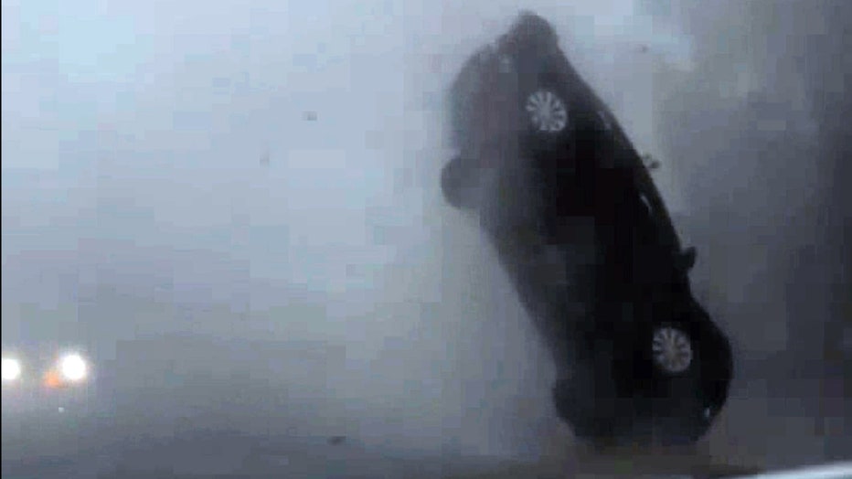 That car is flying Wild video shows Idalia fueled tornado flip