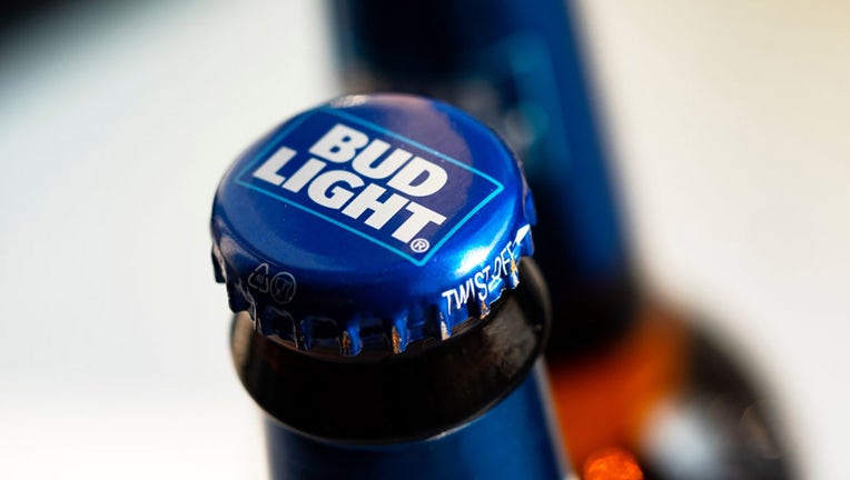 FILE - A Bud Light beer bottle is seen displayed in a store. (Photo Illustration by Igor Golovniov/SOPA Images/LightRocket via Getty Images)