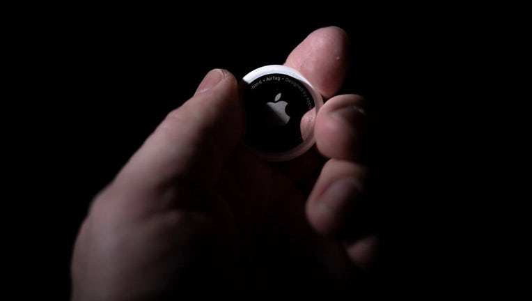 This photo illustration taken on Feb. 13, 2023, shows an Apple Air Tag in Washington, DC. (Photo by BRENDAN SMIALOWSKI/AFP via Getty Images)