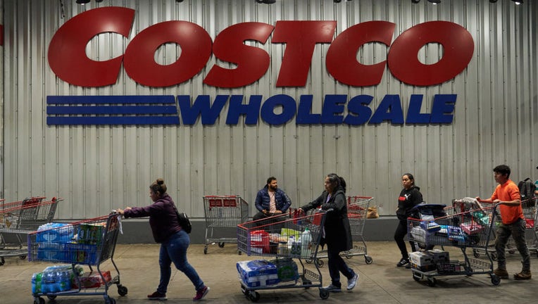 FILE - Shoppers outside a Costco store in New York, on May 20, 2023. Photographer: Bing Guan/Bloomberg via Getty Images