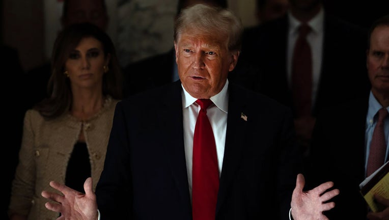 Former President Donald Trump addresses the press during a lunch break on the third day of his civil fraud trial at New York State Supreme Court on Oct. 4, 2023 in New York City. (Photo by David Dee Delgado/Getty Images)