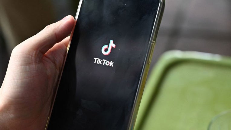 FILE - The logo of the social media platform TikTok is displayed on a mobile phone on Oct. 6, 2023. (Photo by NHAC NGUYEN/AFP via Getty Images)