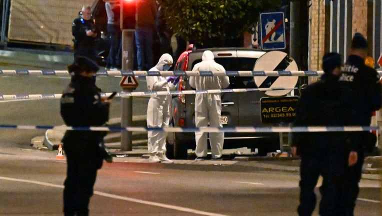 Police cordon off the area and take security measures around the King Baudouin Stadium after a gunman killed at least two Swedish nationals in Brussels, Belgium on Oct. 17, 2023. (Photo by Dursun Aydemir/Anadolu via Getty Images)