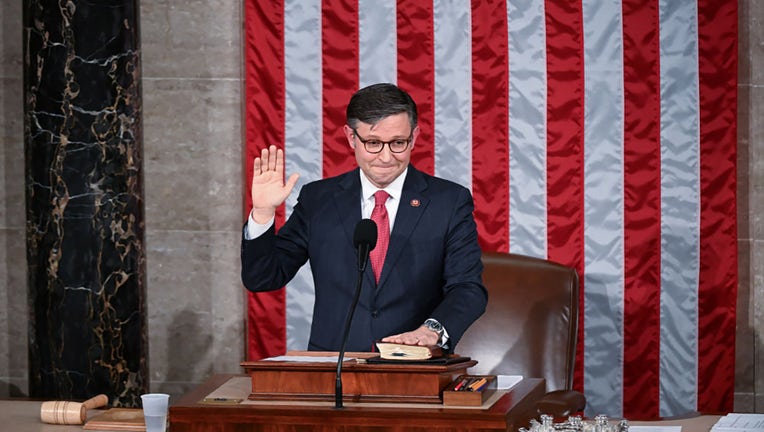 Speaker of the House elect Mike Johnson (R-LA) takes the oath in the House chambers as members of the House of Reprsentatives gather at the United States Capitol to vote for Speaker of the House on Oct. 25, 2023, in Washington, DC. (Photo by Matt McClain/The Washington Post via Getty Images)