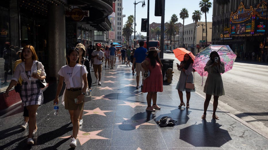 FILE - Tourists are seen on Hollywood Walk of Fame in Los Angeles, California, on Sept. 3, 2022. (Photo by Tayfun Coskun/Anadolu Agency via Getty Images)
