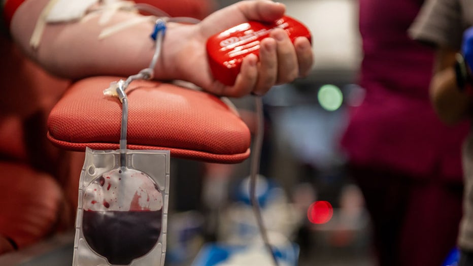 FILE - A person donates blood on May 25, 2022, in Uvalde, Texas. (Photo by Brandon Bell/Getty Images)