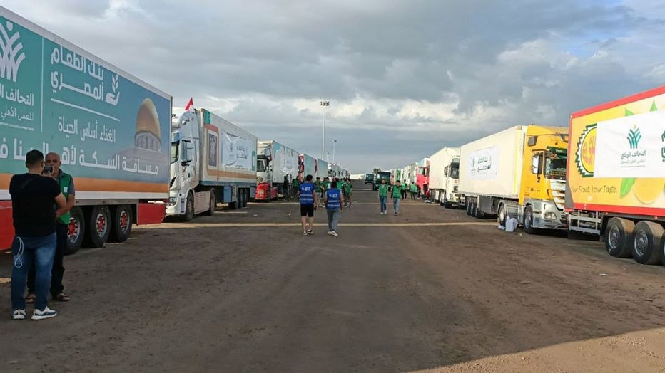 FILE - Trucks loaded with humanitarian aid supplies are seen at the Rafah crossing to be transported to Gaza Strip from Rafah, Egypt on October 17, 2023. (Photo by Stringer/Anadolu via Getty Images)