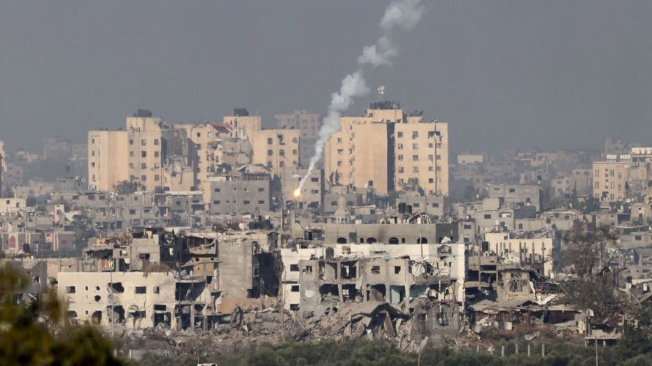 FILE - A picture taken from the southern Israeli city of Sderot on Oct. 26, 2023 shows flares fired by the Israeli army over the northern Gaza Strip, amid the ongoing war between Israel and the Palestinian group Hamas. (Photo by JACK GUEZ/AFP via Getty Images)