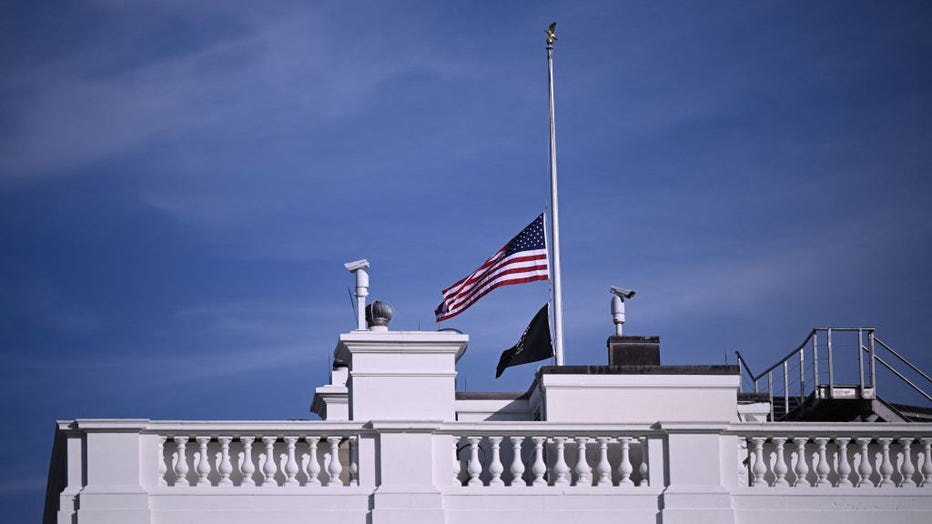 The US flag flies at half-staff atop the White House in Washington, DC, on October 26, 2023, after a gunman killed 18 people in Lewiston, Maine. (Photo by BRENDAN SMIALOWSKI/AFP via Getty Images)
