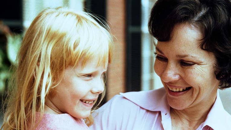 07-Rosalynn-Carter-holds-daughter-Amy_circa-1970.jpg