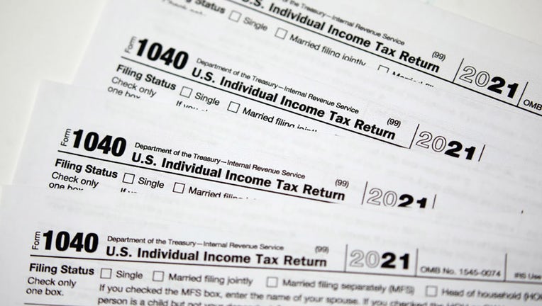 FILE - IRS 1040 Individual income tax forms for 2021 arranged in Louisville, Kentucky, U.S., on April 12, 2022. Photographer: Luke Sharrett/Bloomberg via Getty Images