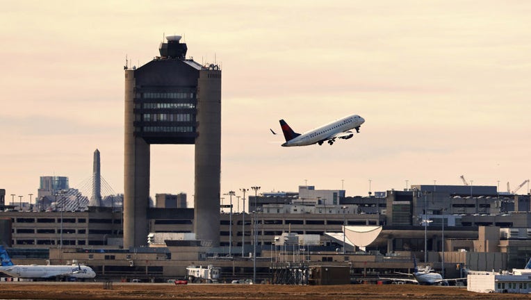 FILE IMAGE - An airplane takes off from Boston Logan International Airport on March 8, 2023, in Boston, Massachusetts. (Photo by Pat Greenhouse/The Boston Globe via Getty Images)