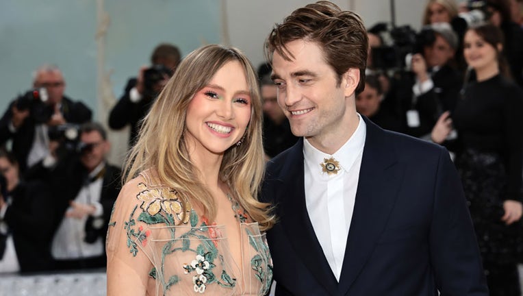 FILE - Suki Waterhouse and Robert Pattinson attend The 2023 Met Gala Celebrating "Karl Lagerfeld: A Line Of Beauty" at The Metropolitan Museum of Art on May 1, 2023, in New York City. (Photo by Jamie McCarthy/Getty Images)