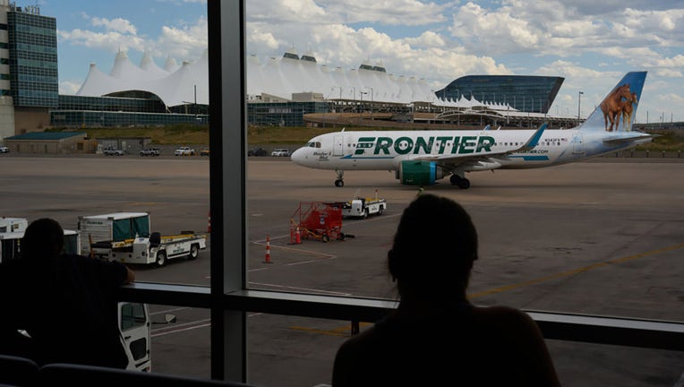 FILE - An Airbus A320-251N aircraft, operated by Frontier, arrives at the Jeppesen Terminal at Denver International Airport (DEN) in Denver, Colorado, on Aug. 19, 2023. Photographer: Bing Guan/Bloomberg via Getty Images
