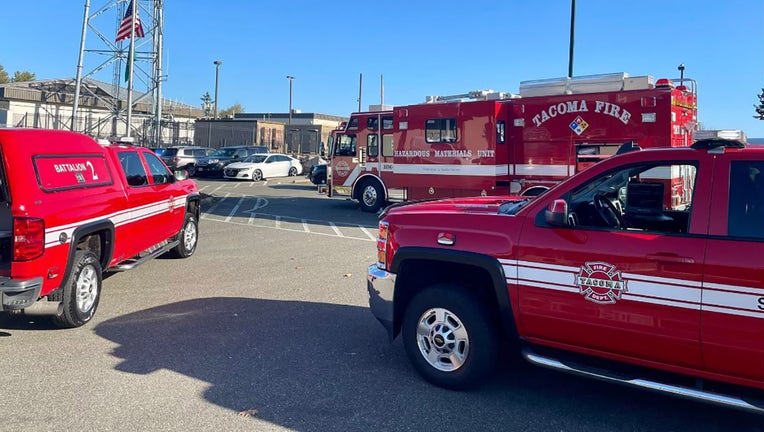 A photo shows emergency vehicles at the scene of a possible hazardous substance reported at an election office in Pierce County, Washington. (Credit: Tacoma FD)