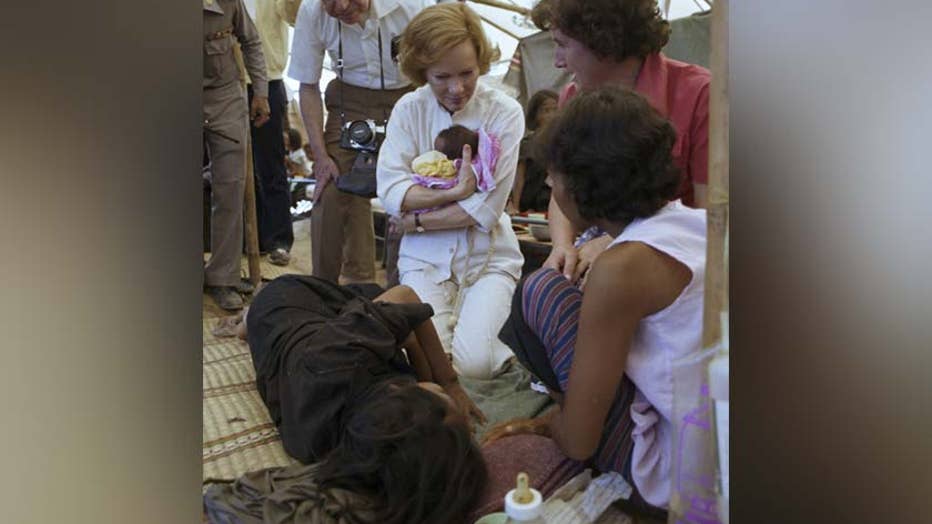 21-Rosalynn-Carter-holds-baby-at-a-camp-for-Cambodian-refugees-in-Thailand_11-9-79.jpg