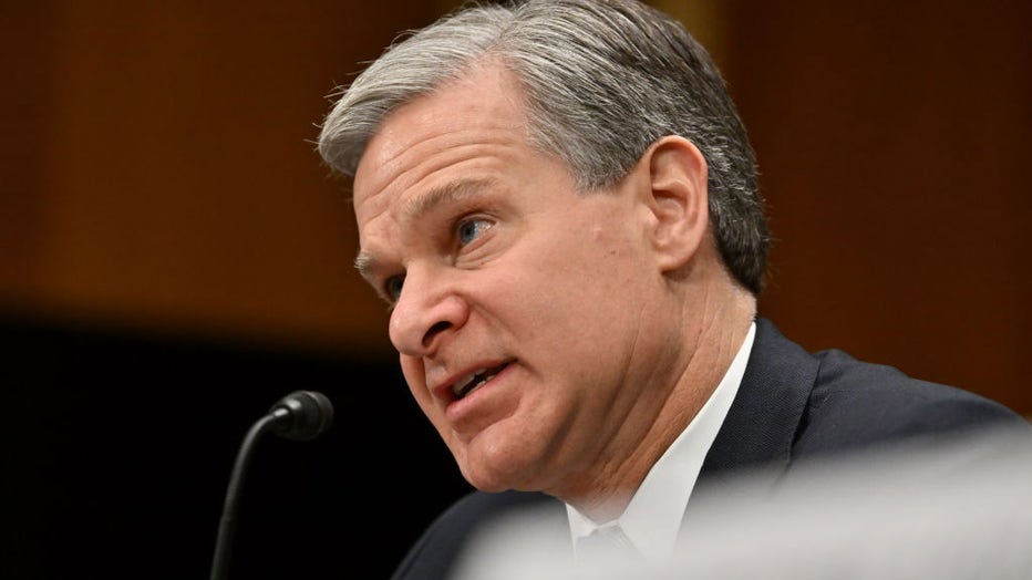 Witness Christopher A. Wray Director, FBI director, makes his opening statements during a Senate Homeland Security and Governmental Affairs Hearing to examine threats to the homeland at the Dirksen Senate Office Building on Oct. 31, 2023, in Washington, D.C. (Photo by Ricky Carioti/The Washington Post via Getty Images)