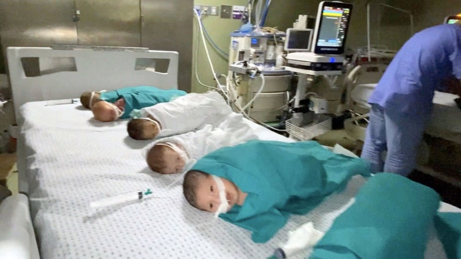 A screen grab captured from a video shows premature babies under treatment in the neonatal intensive care unit remove from the incubators and transferred to another department in the hospital after Israeli attack on Shifa Hospital in Gaza City, Gaza on November 14, 2023. (Photo by Palestinian Prime Ministry/Anadolu via Getty Images)